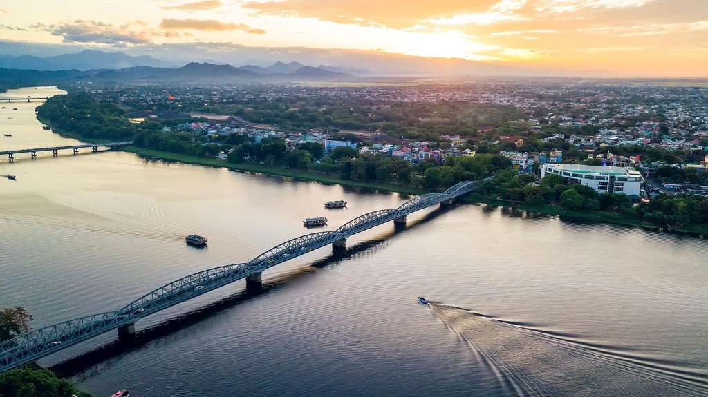 Aerial view of Huong River flowing through the historic city of Hue