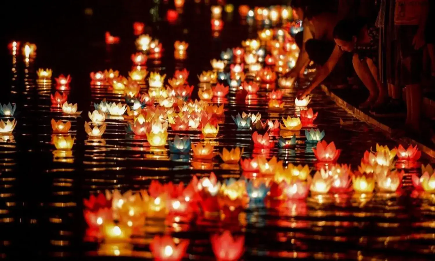 Boat ride along the Perfume River with lantern lights in Hue