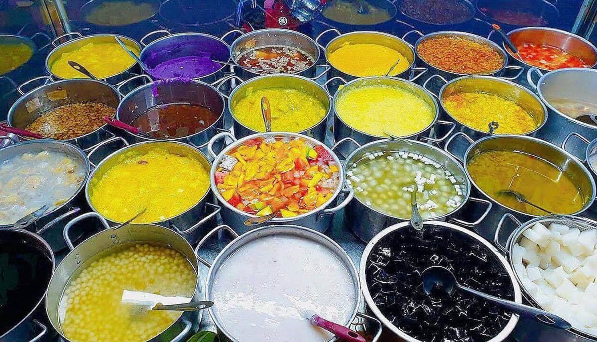 Colorful Vietnamese sweet soup dessert with beans and coconut milk