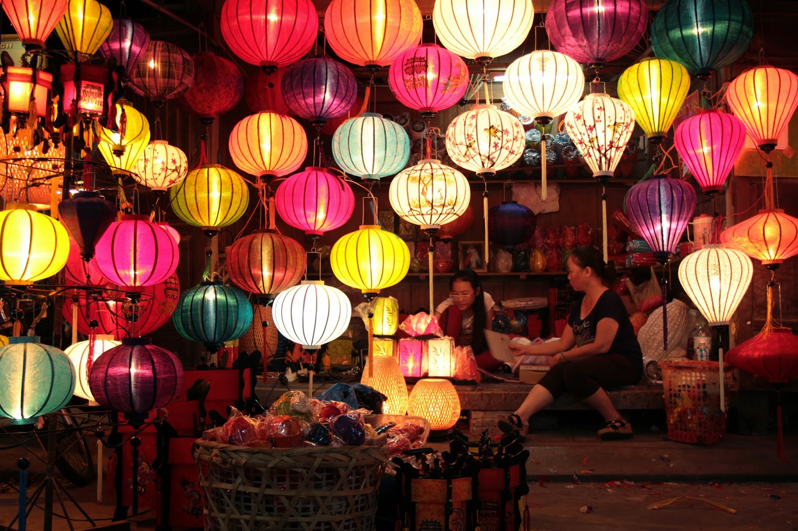 Hoi An ancient town with lanterns and riverside view at sunset