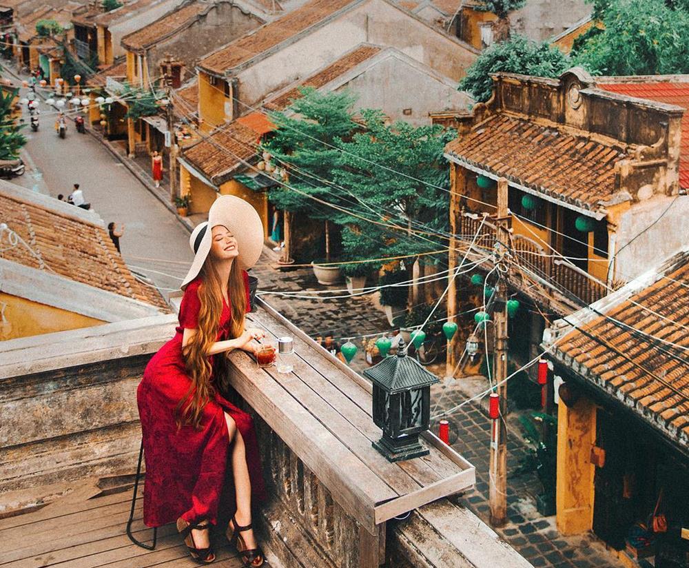 Rooftop bar overlooking lantern-lit streets in Hoi An old town