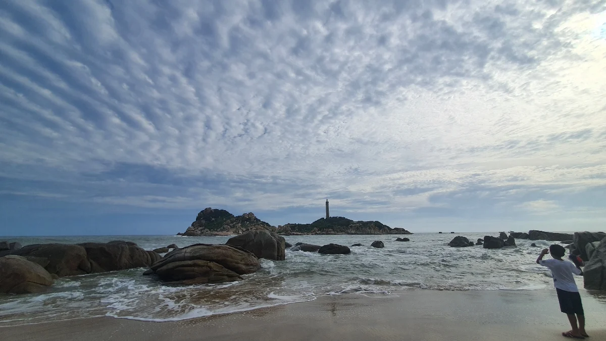 Rough sea conditions near island during rainy season