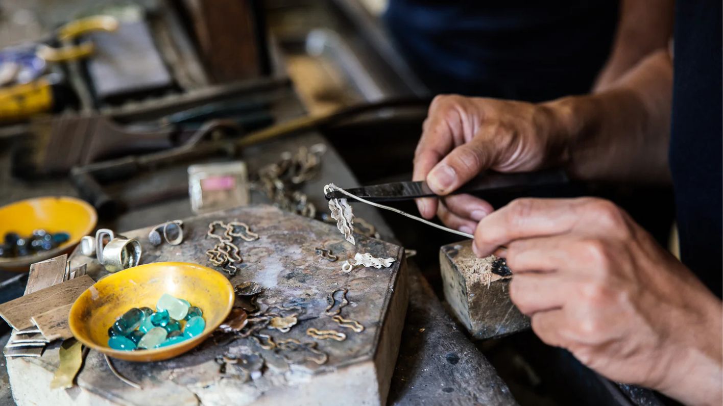Travelers enjoying a Silver Smithing Class at Bien Bac workshop in Hoi An
