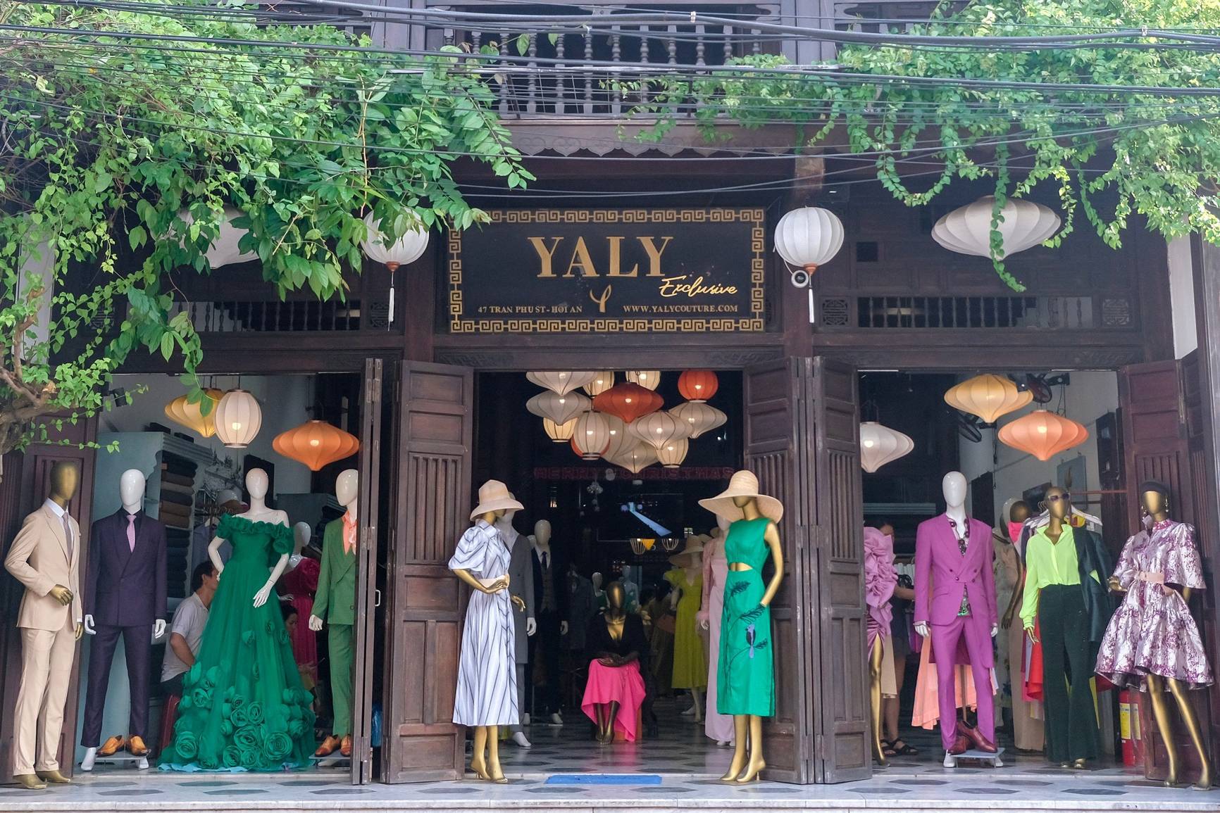 Boutique tailoring studio with fabric collections in Hoi An