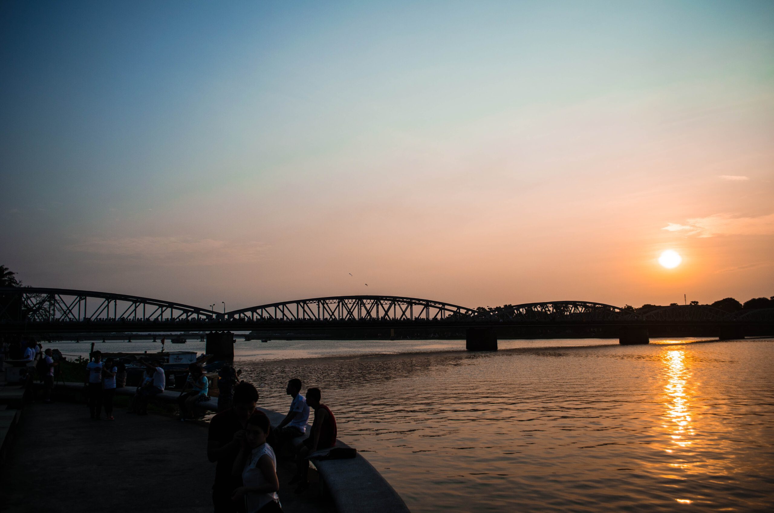 Sunset atmosphere at a riverside park in Hue