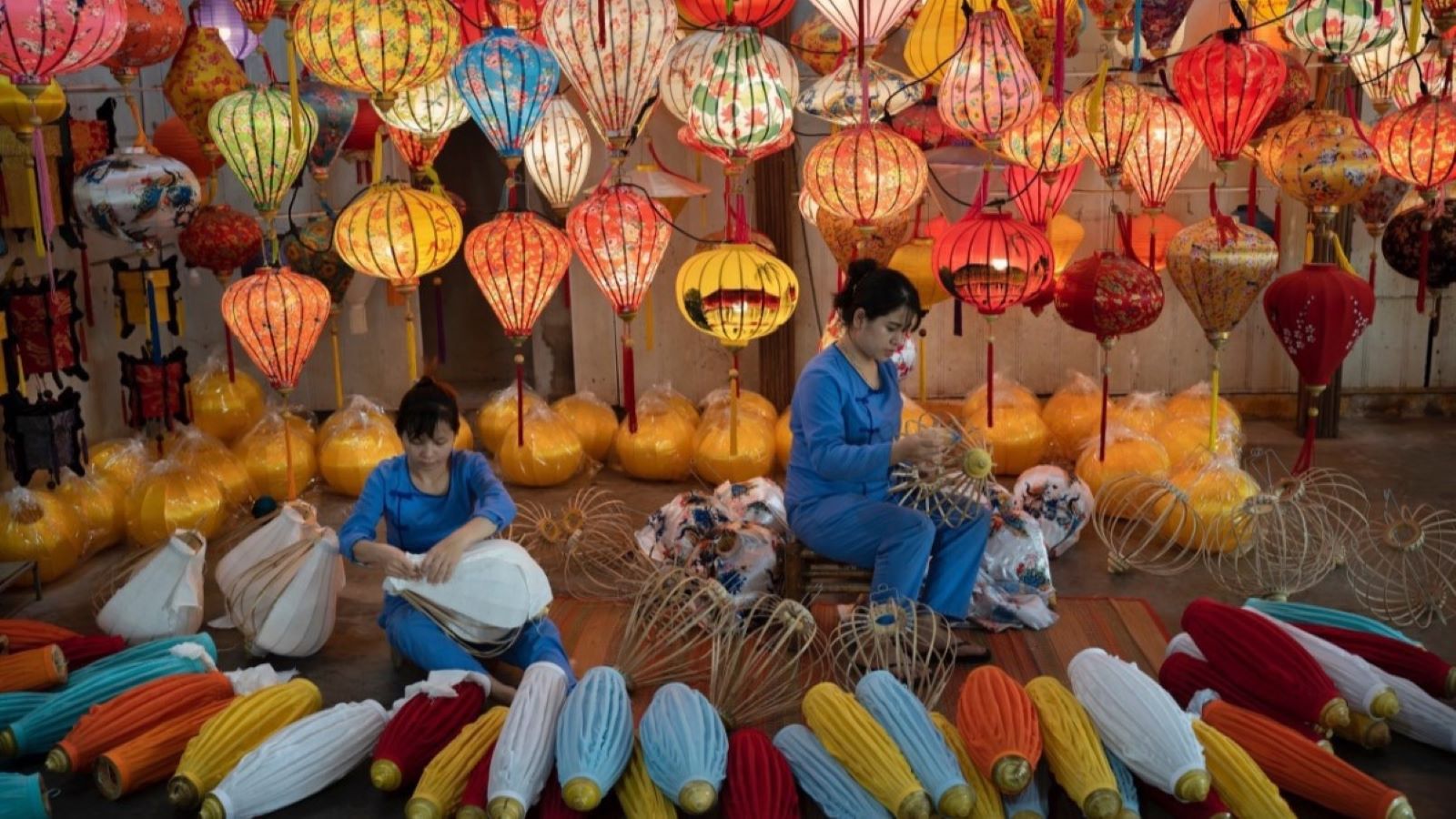 Traditional Vietnamese craft village with artisans creating handmade products