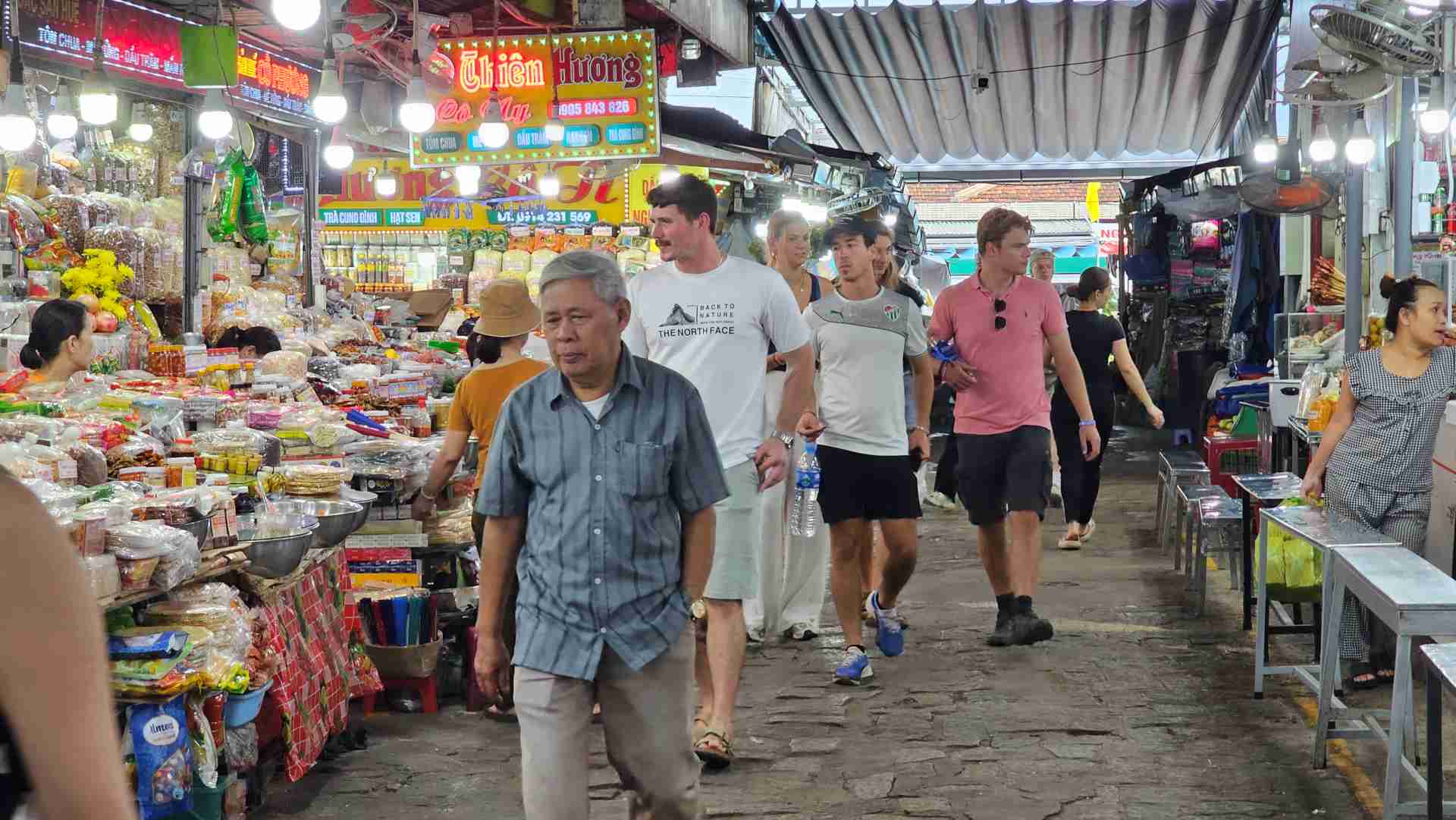 Traveler negotiating prices with a friendly local vendor