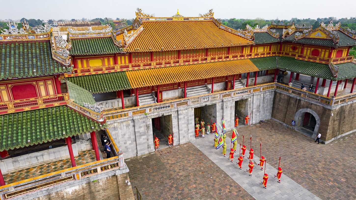 Travelers walking through the main pathway toward the Imperial City