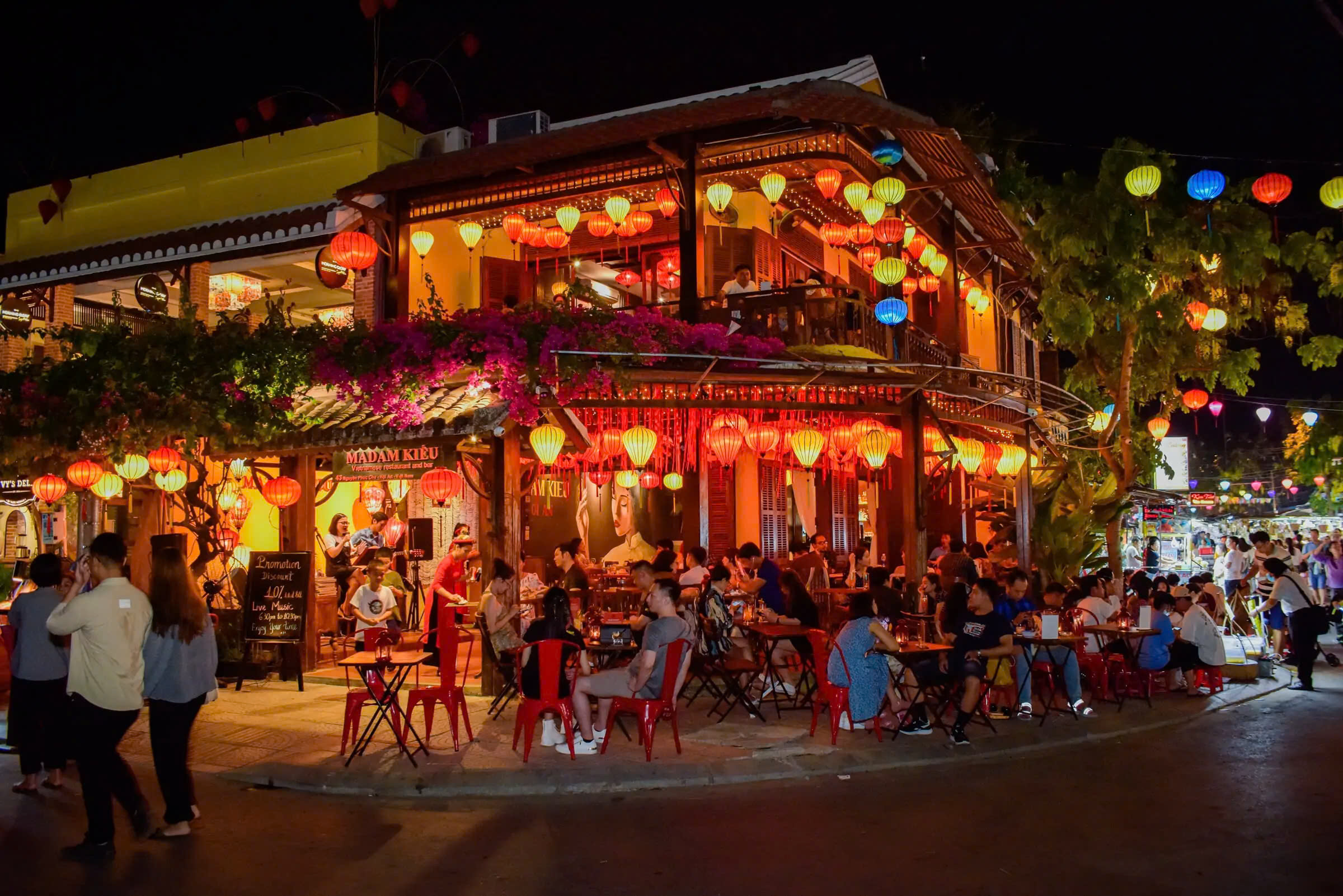 Vietnamese street food and lantern-lit cafés near the Hoi An riverfront