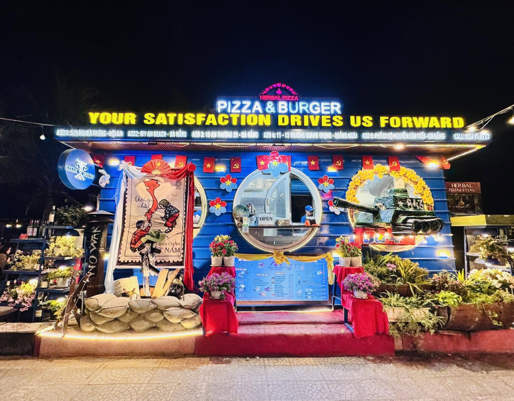 Wood-fired pizza and burgers make Herbal Pizza a popular casual stop near My Khe Beach