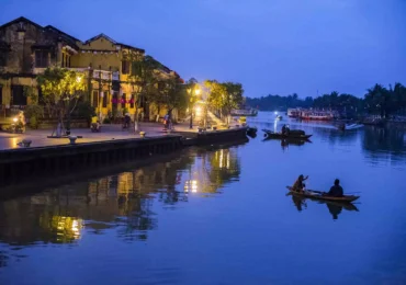 Hoi An City by Night takes you along the scenic Hoai River, where the peaceful waters reflect glowing lanterns. 