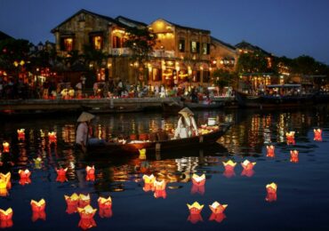 Hoi An City by Night offers a magical atmosphere with glowing lanterns illuminating the ancient town. 