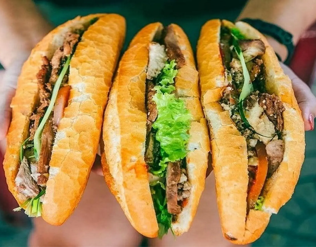 Hoi An Banh Mi – A world-famous Vietnamese sandwich filled with fresh herbs, savory meats, and homemade sauces