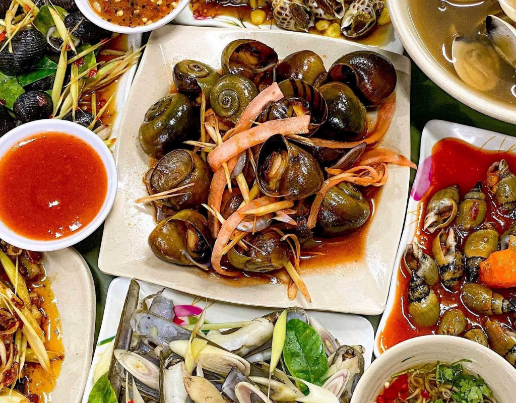Fresh snails, shellfish, squid, and other seafood are prepared in a variety of flavorful local styles.