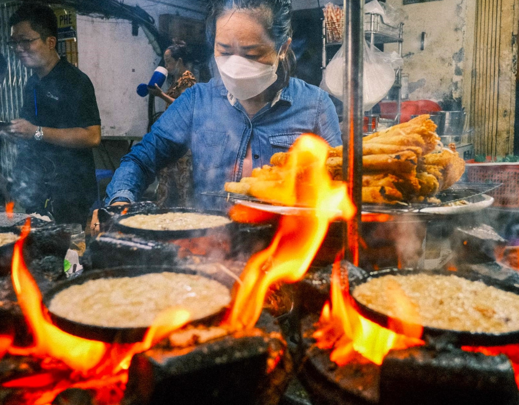 Small local snacks offer an easy way to sample different Vietnamese flavors while exploring the city.