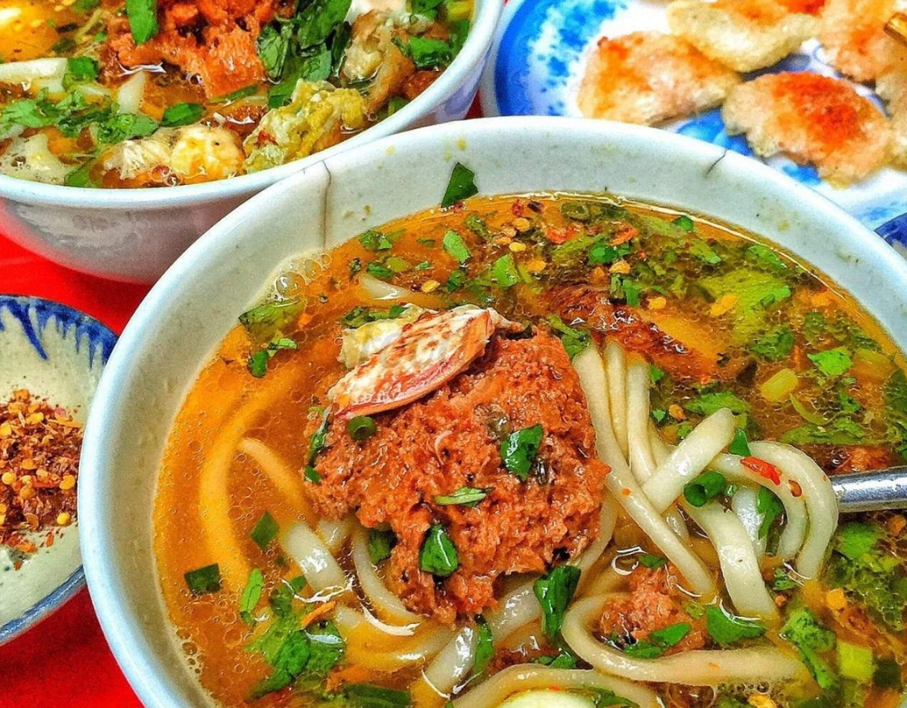 Thick, chewy noodles and a comforting broth make Banh Canh a satisfying choice for a casual meal.
